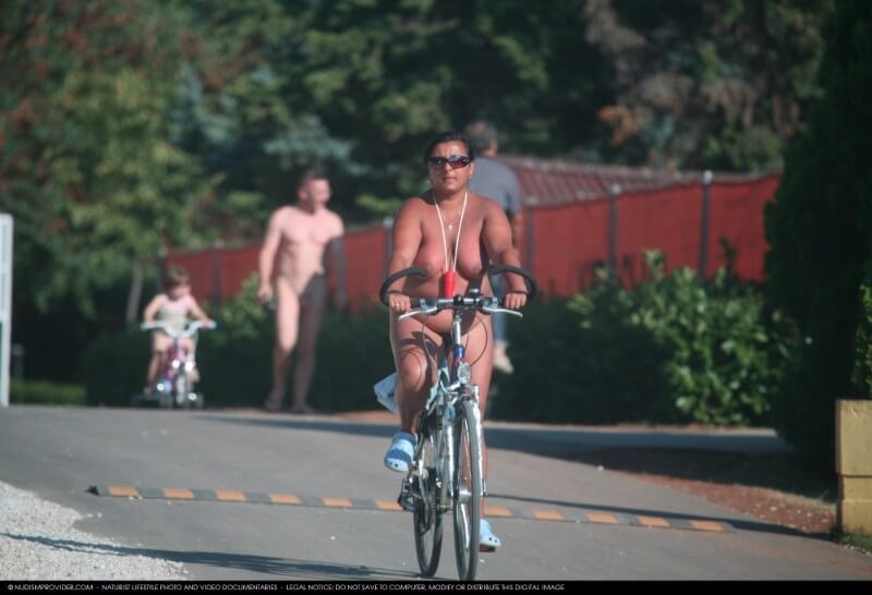 Naturists Road Biking pics - The practice of nudity within a community