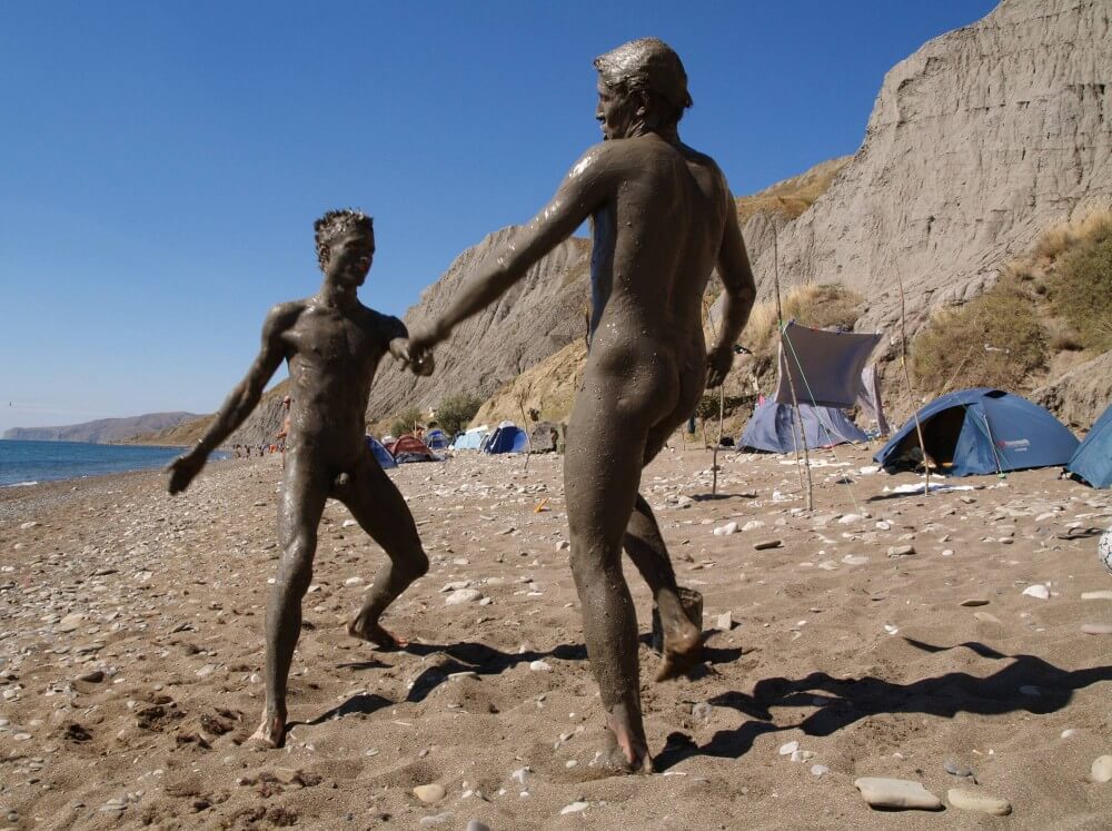 Jr Nudist Nude Beach Mud Soldiers photos - Clothing is also a mask for a nudist