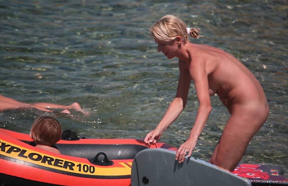 Red Boating for Two Nudists pics - Nudism promotes personal freedom