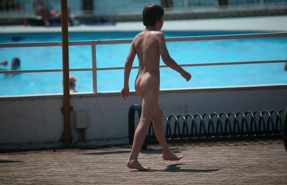 Grassy Patio Nature Hike - A defining feature of naturism is the absence of clothing
