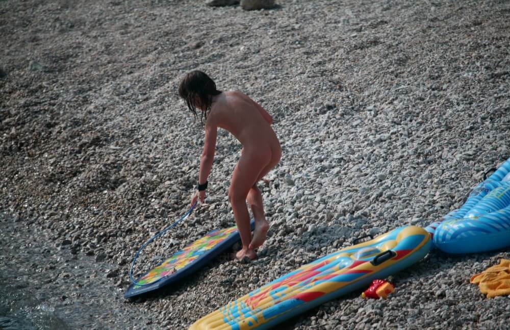 Naturist Surf Board Glides pics - The equality of naked human bodies helps us accept ourselves and others