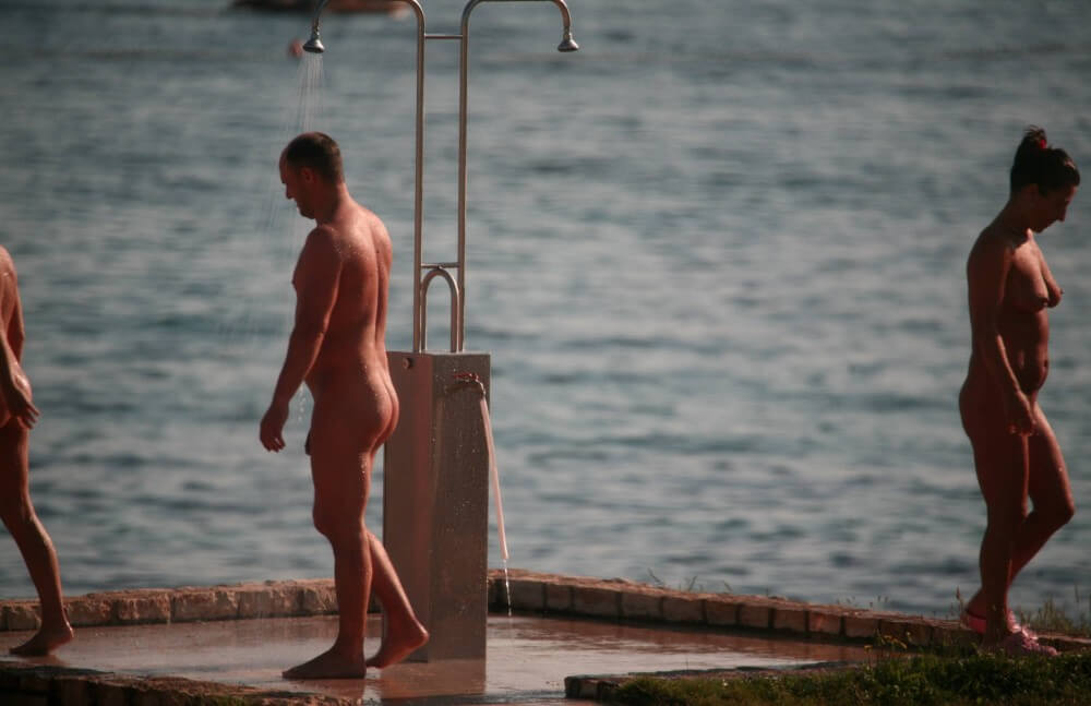 Naturist Shower at Dusk pics - Activities conducted in a state of complete nudity
