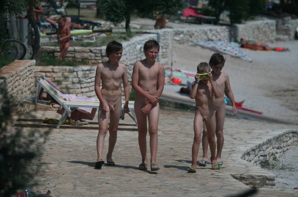 Shore walking nude - Clothing is a barrier for a nudist