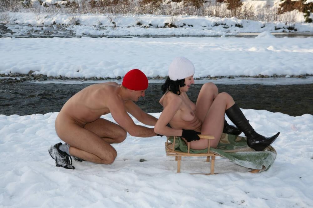 Naturist Girl Snow Day Couples Sled pics - Minimizing clothing or nudism