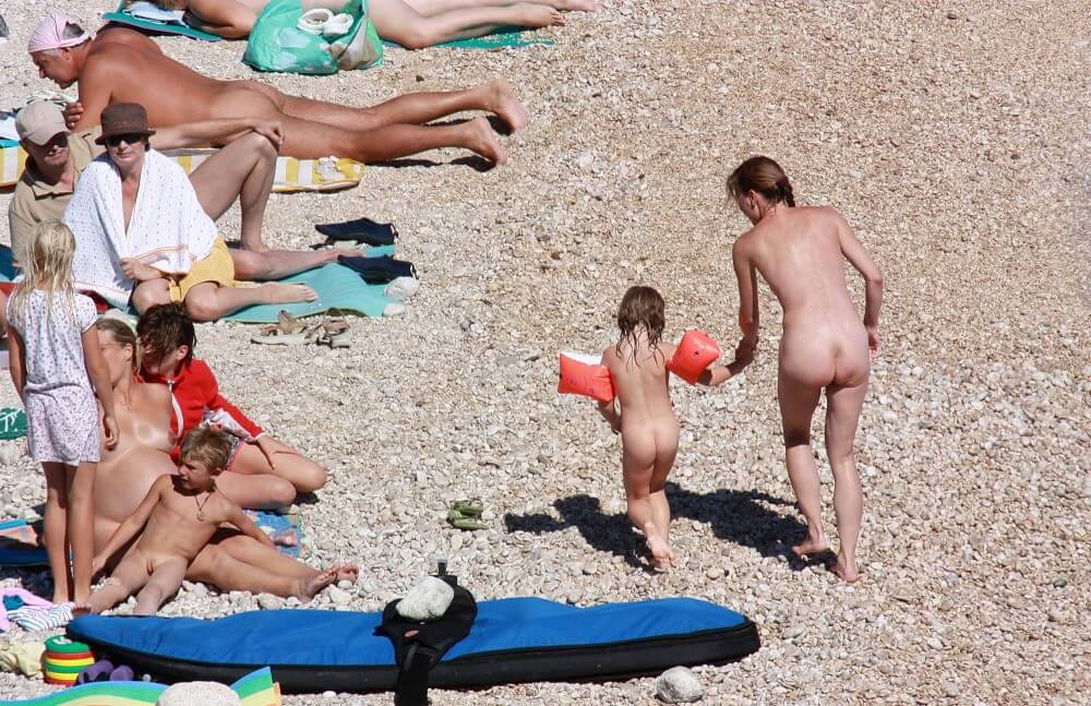 Orange Floaty Safety First Naturist pics - Nudity should be natural