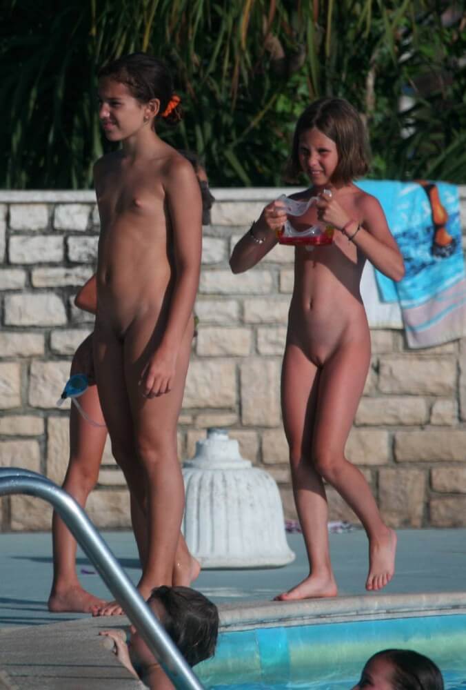 Two Poolside Nudist Girls pics - Nudity promotes inner harmony and peace of mind